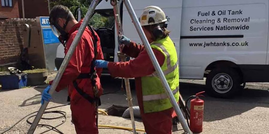 Preparing to go underground to conduct underground fuel tank cleaning